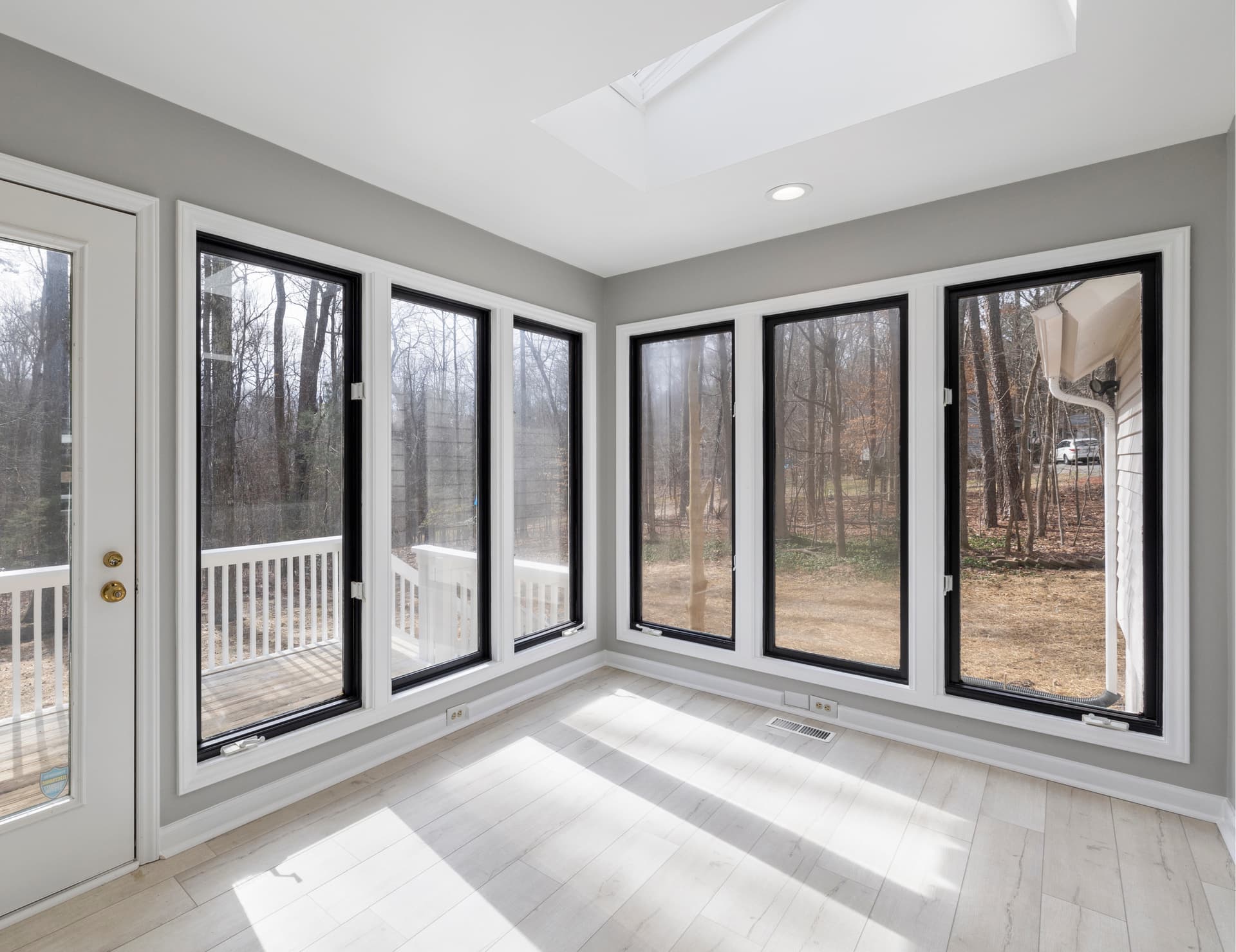 Full-height uPVC & Aluminium sliding doors opening onto a golf course view