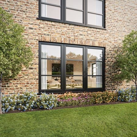 Living room with a wood-effect Aluminium casement window overlooking a garden